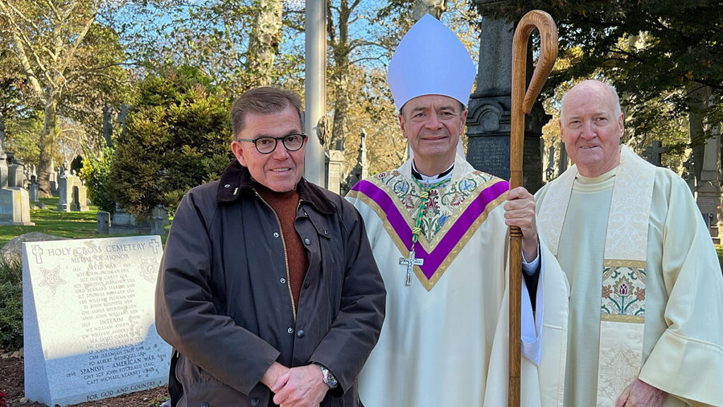Bishop brennan marks all souls day at holy cross cemetery blesses memorial honoring veterans kat
