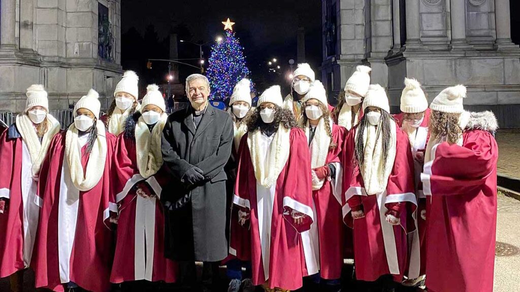 Bishop robert brennan light christmas tree and blesses nativity scene in grand army plaza kat