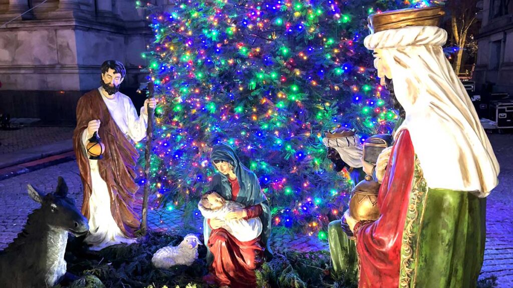 Bishop robert brennan lights christmas tree and blesses nativity scene in grand army plaza kat