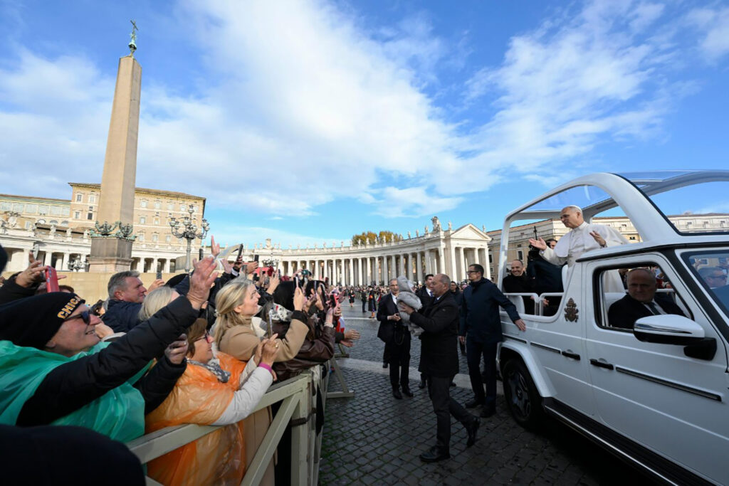 Pope greeting audience