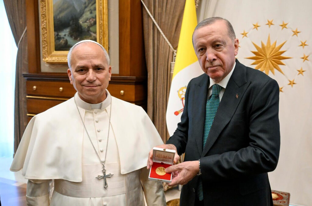 Pope presented medal body