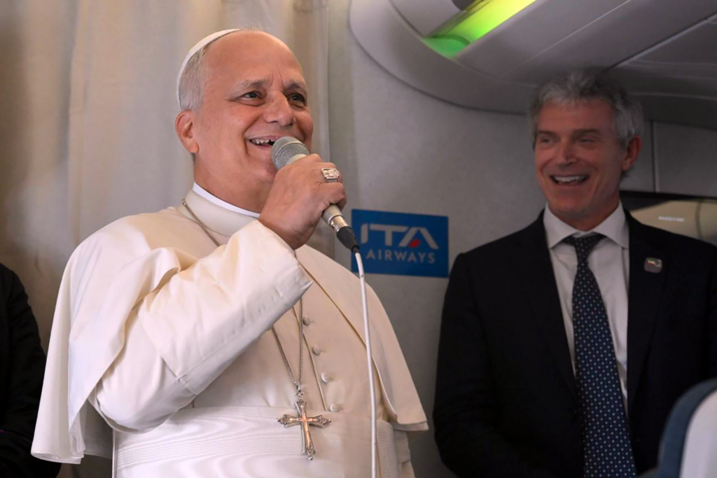 Pope 1 plane smile