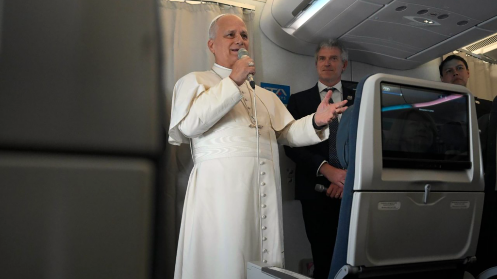 Pope iran interview plane head