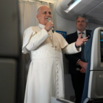 Pope iran interview plane head