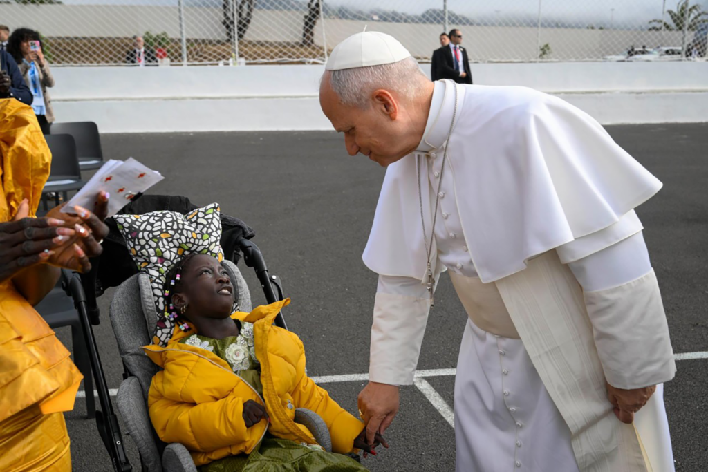 Pope migrants body