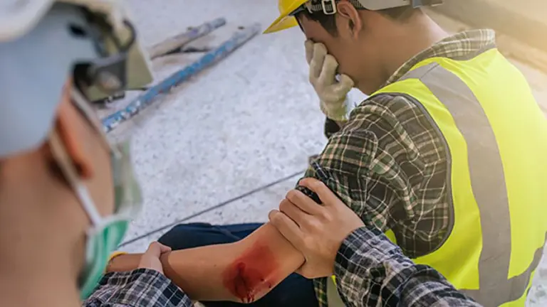 Construction worker on scaffolding at a job site
