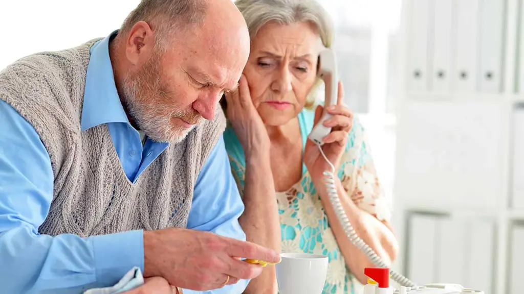 Senior checks Annual Notice of Change letter before Medicare 2027 enrollment