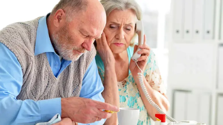 Senior checks Annual Notice of Change letter before Medicare 2027 enrollment