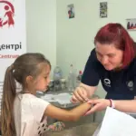 Caritas polska ukr aid head
