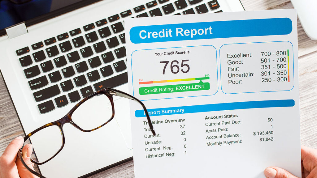 Credit report with a 765 score on a laptop – improving your chances of a U.S. mortgage